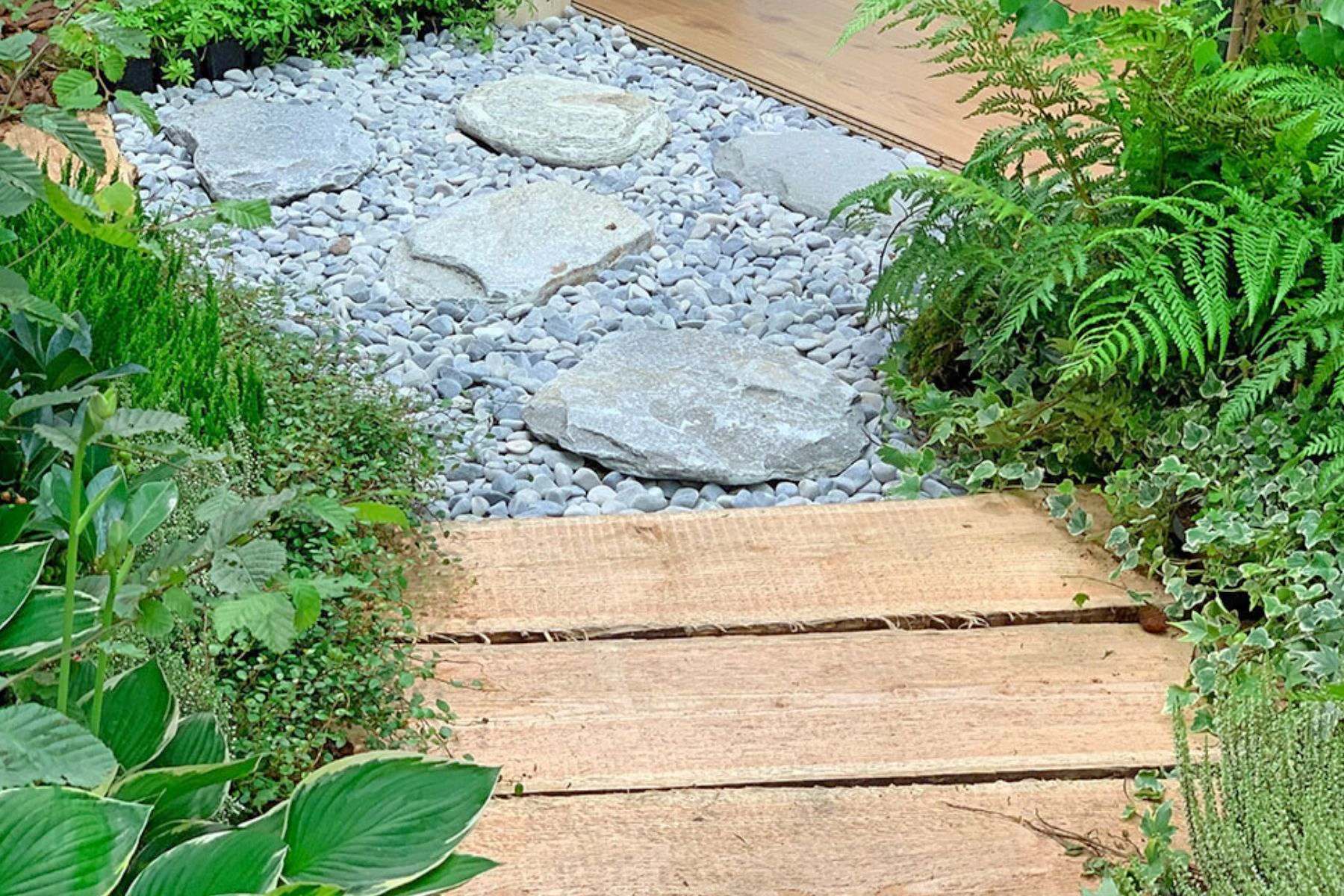 stepping stone with grey pebbles for garden